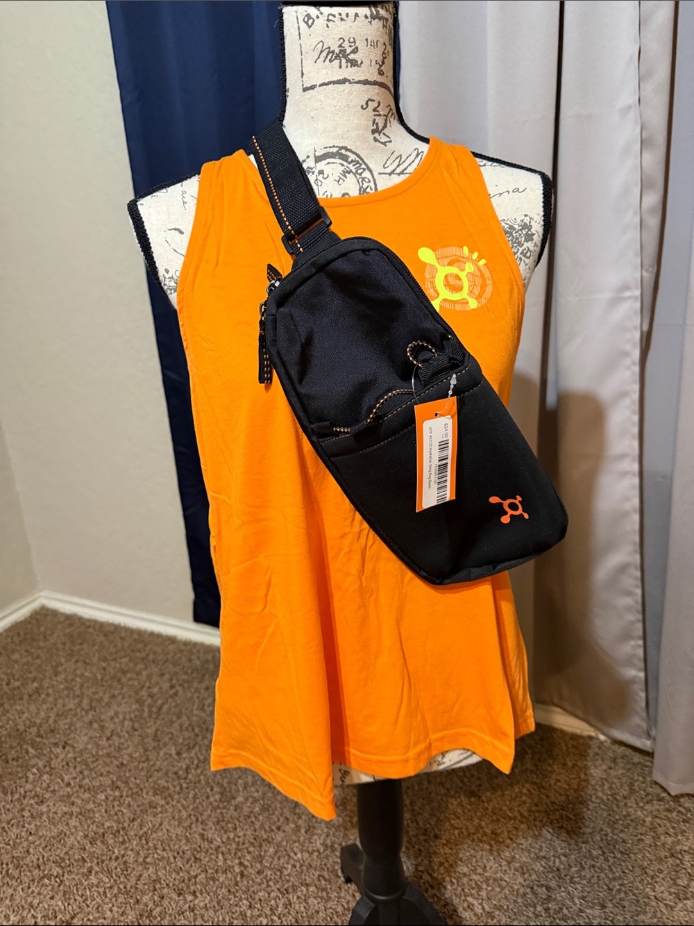OTF Hydration Sling Bag Black - Crossbody Sling Bag with Orange Logo